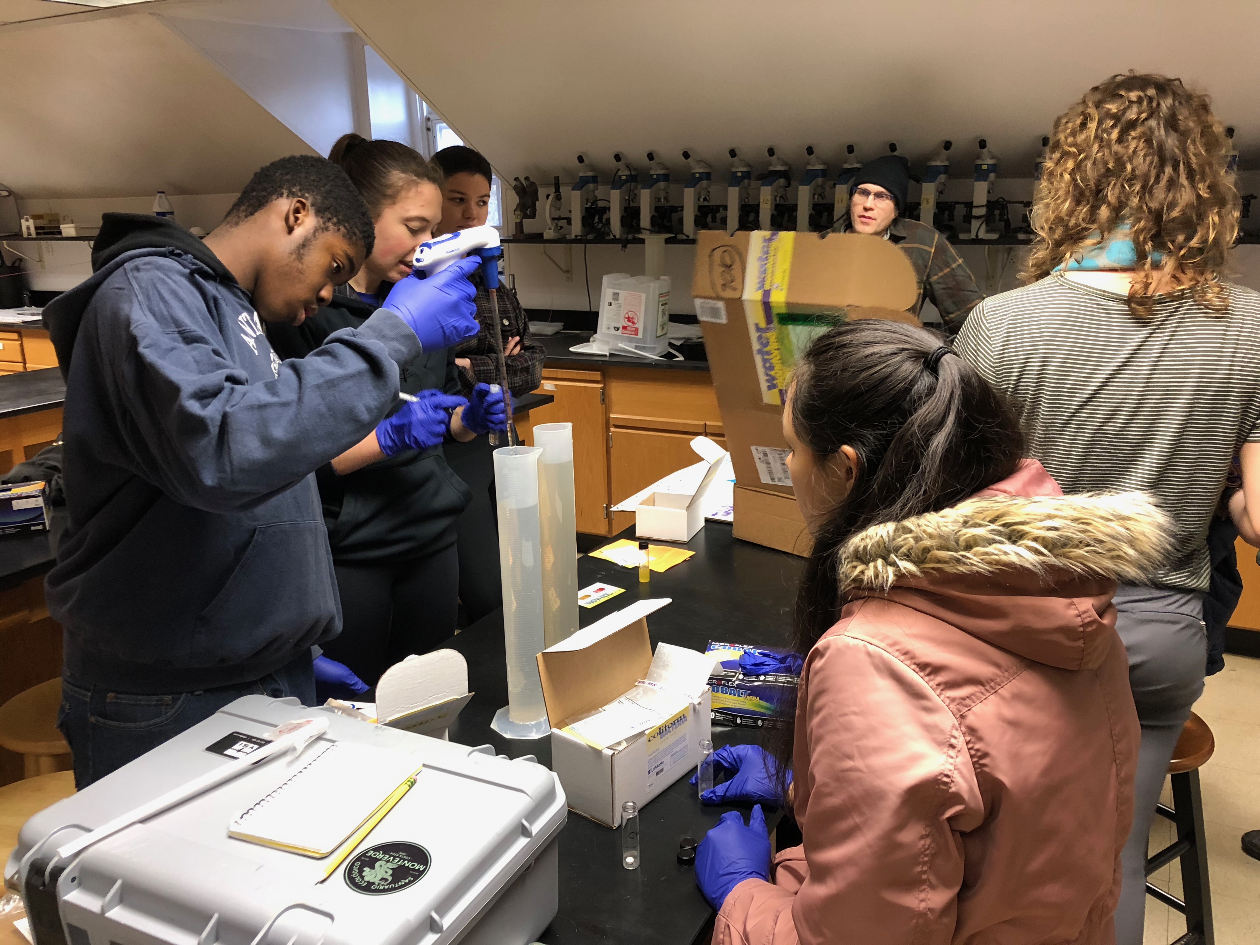 Penn undergrads and PWD Watershed Stewards conducting water quality testing at the Cobbs Creek Environmental Education Center
